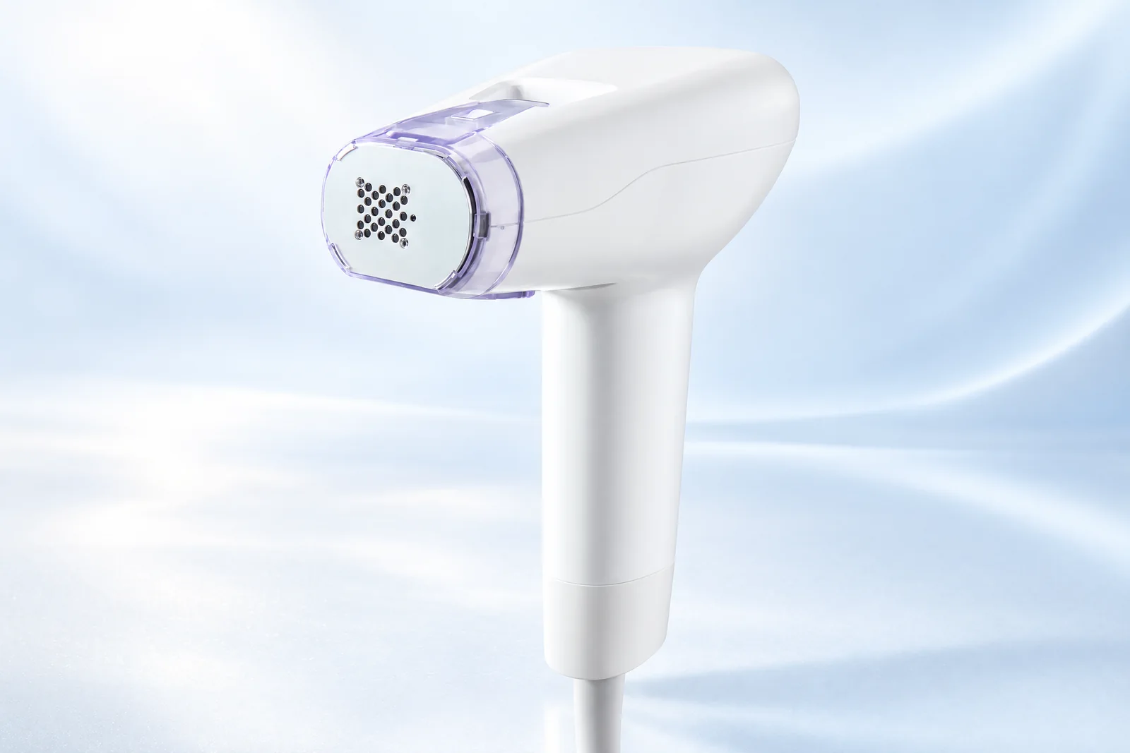 Illustrative Morpheus8 Cool handpiece with its surface-cooling treatment tip